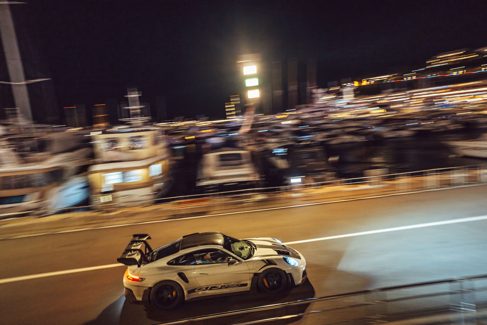 Porsche 911 GT3 RS driving by Monaco Harbour 