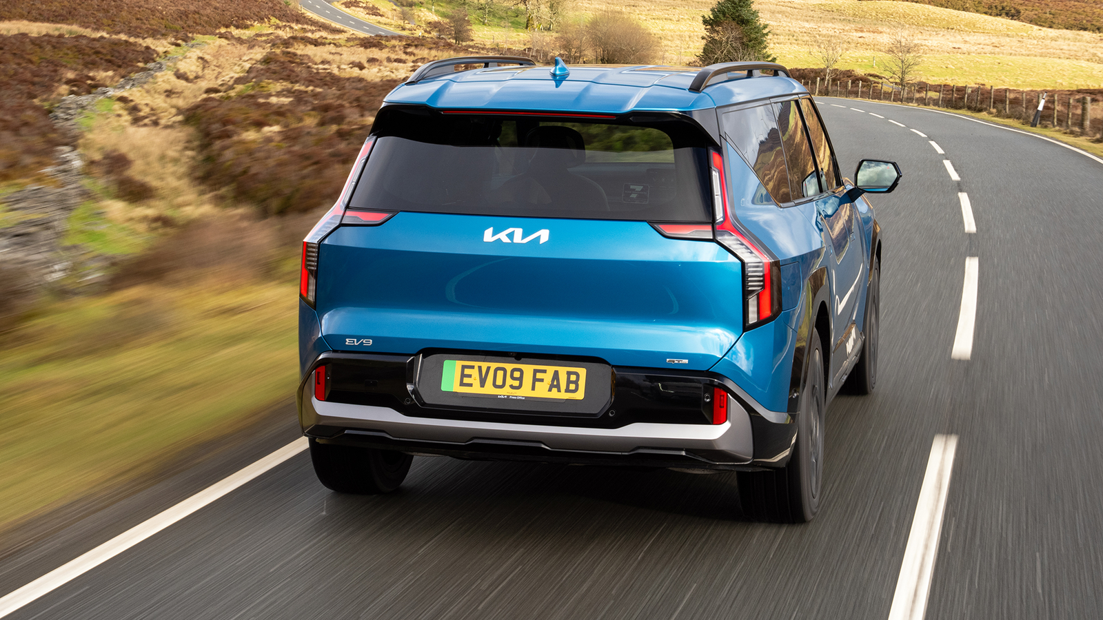 Kia EV9, rear 3/4, driving