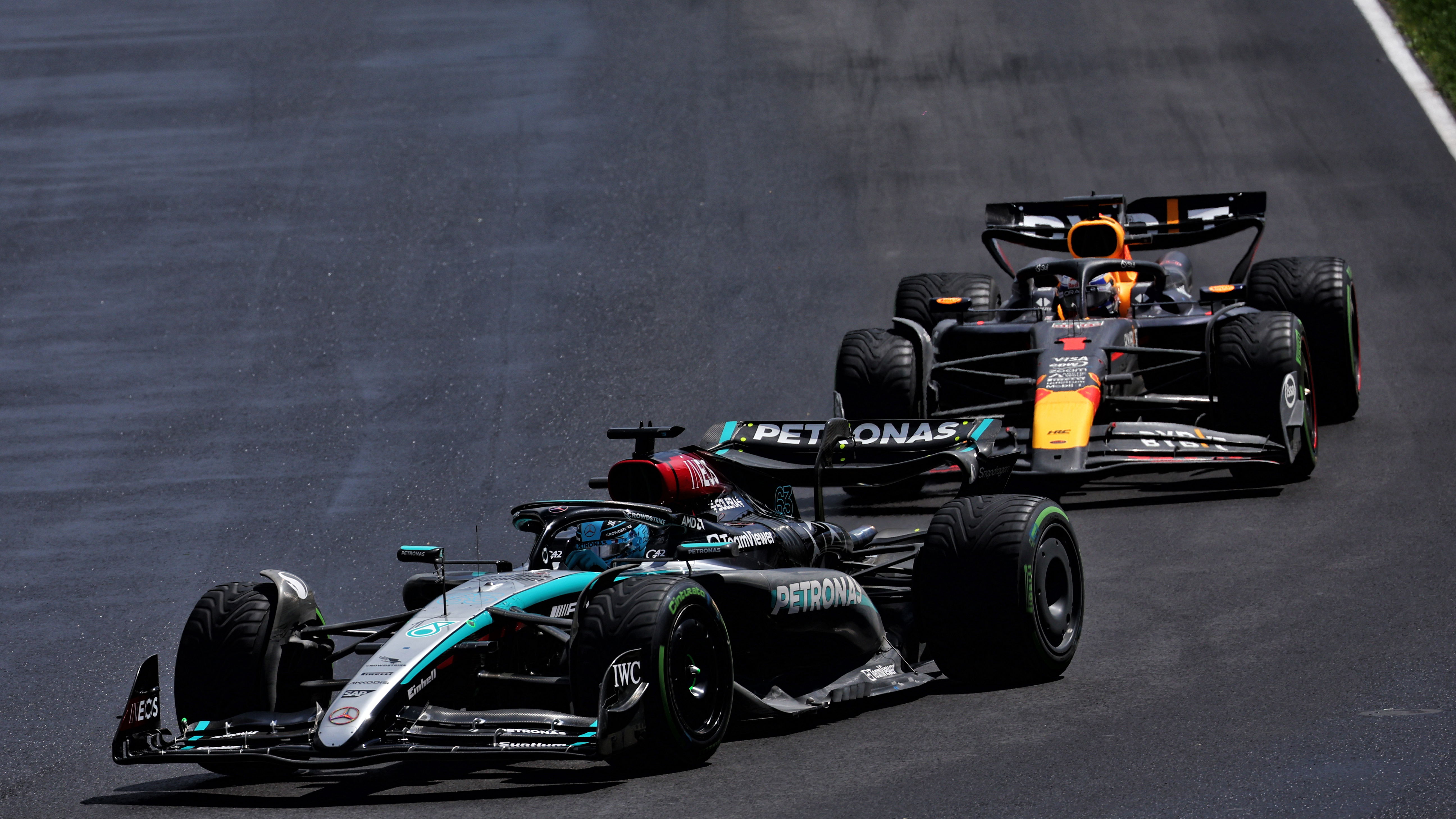 George Russell and Max Verstappen at the 2024 Canadian Grand Prix