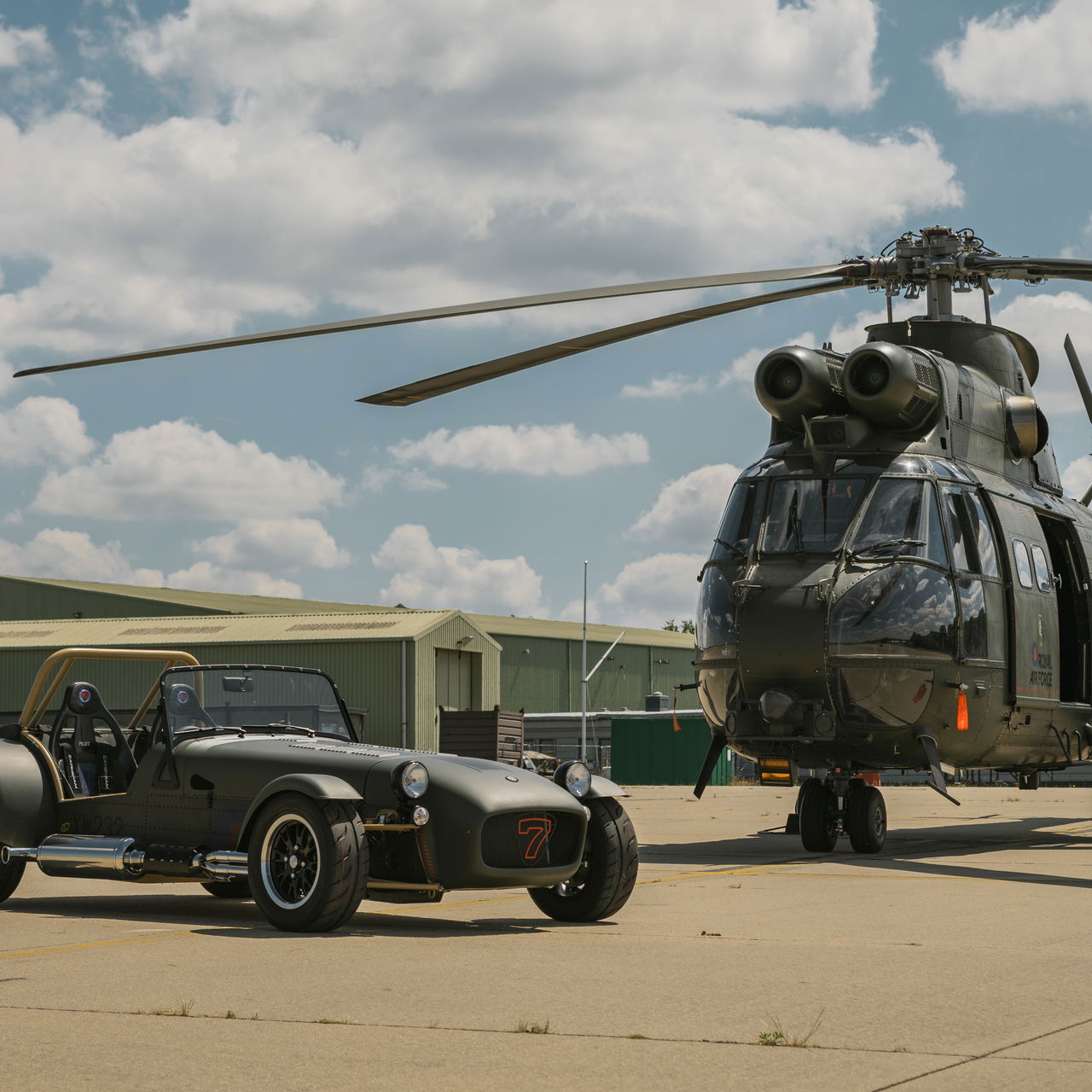 Caterham RAF 360 with Puma helicopter - front