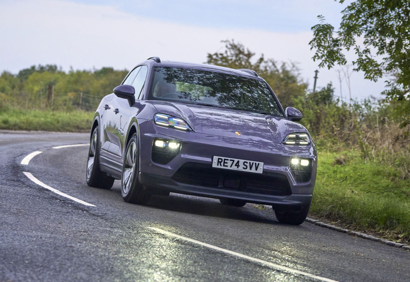 Porsche Macan 4 - front, driving
