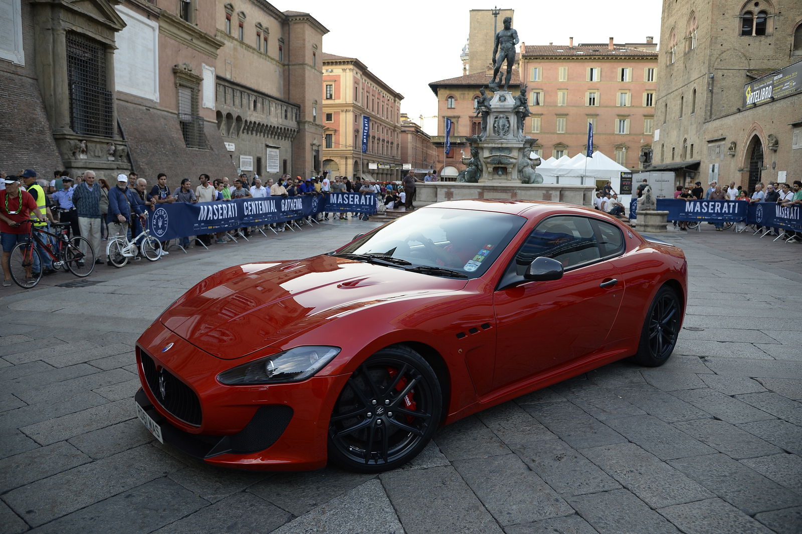 Maserati GranTurismo with the Fountain of Neptune in the background