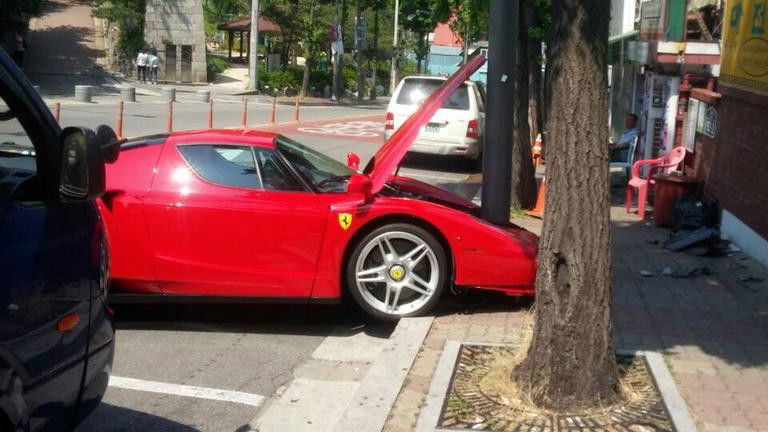 This Ferrari Enzo Was So Hungry, It Ate A Telegraph Pole