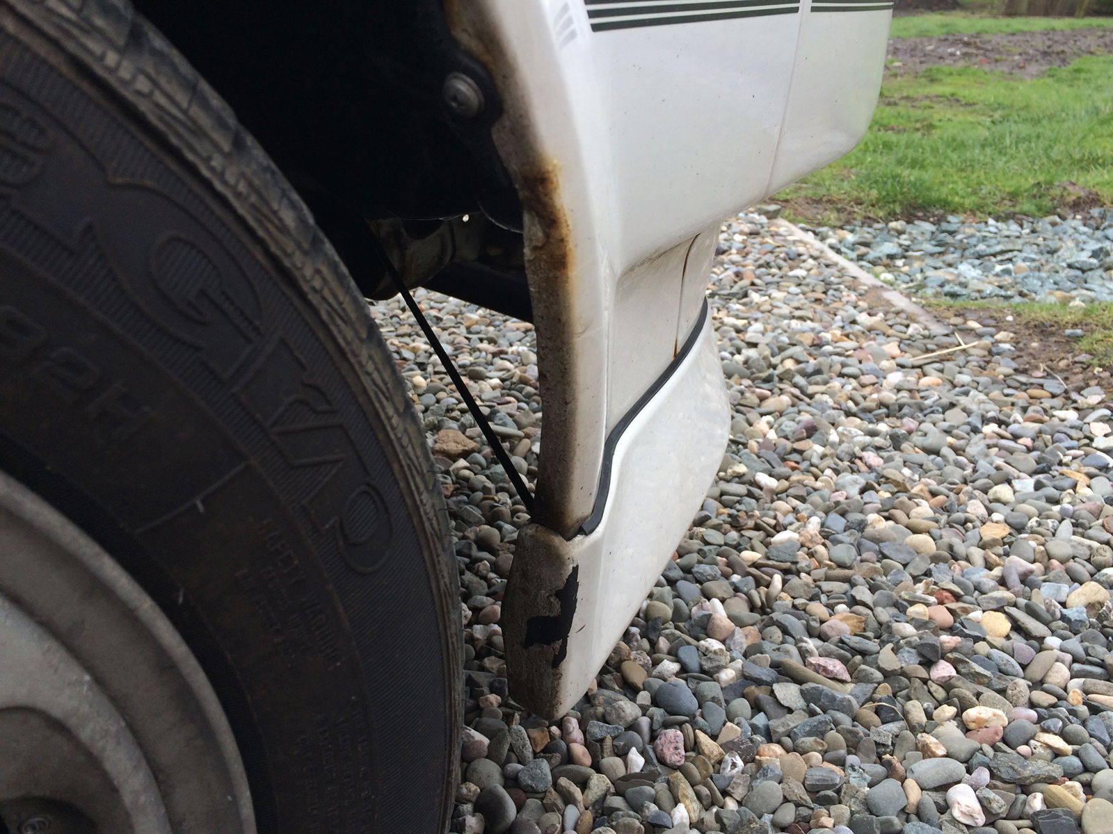 A salty winter has taken its toll on my paint - also note that the crossmember from the bumper to radiator is straight, if not this could be from crash damage