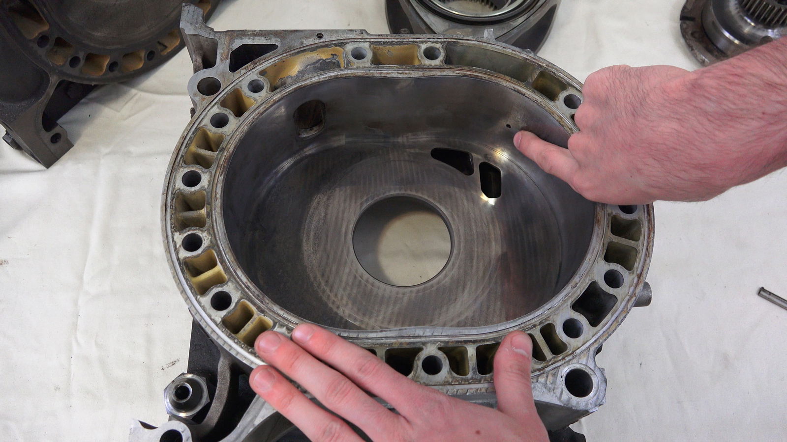 This hole in the housing is where oil is directly injected into during the intake
