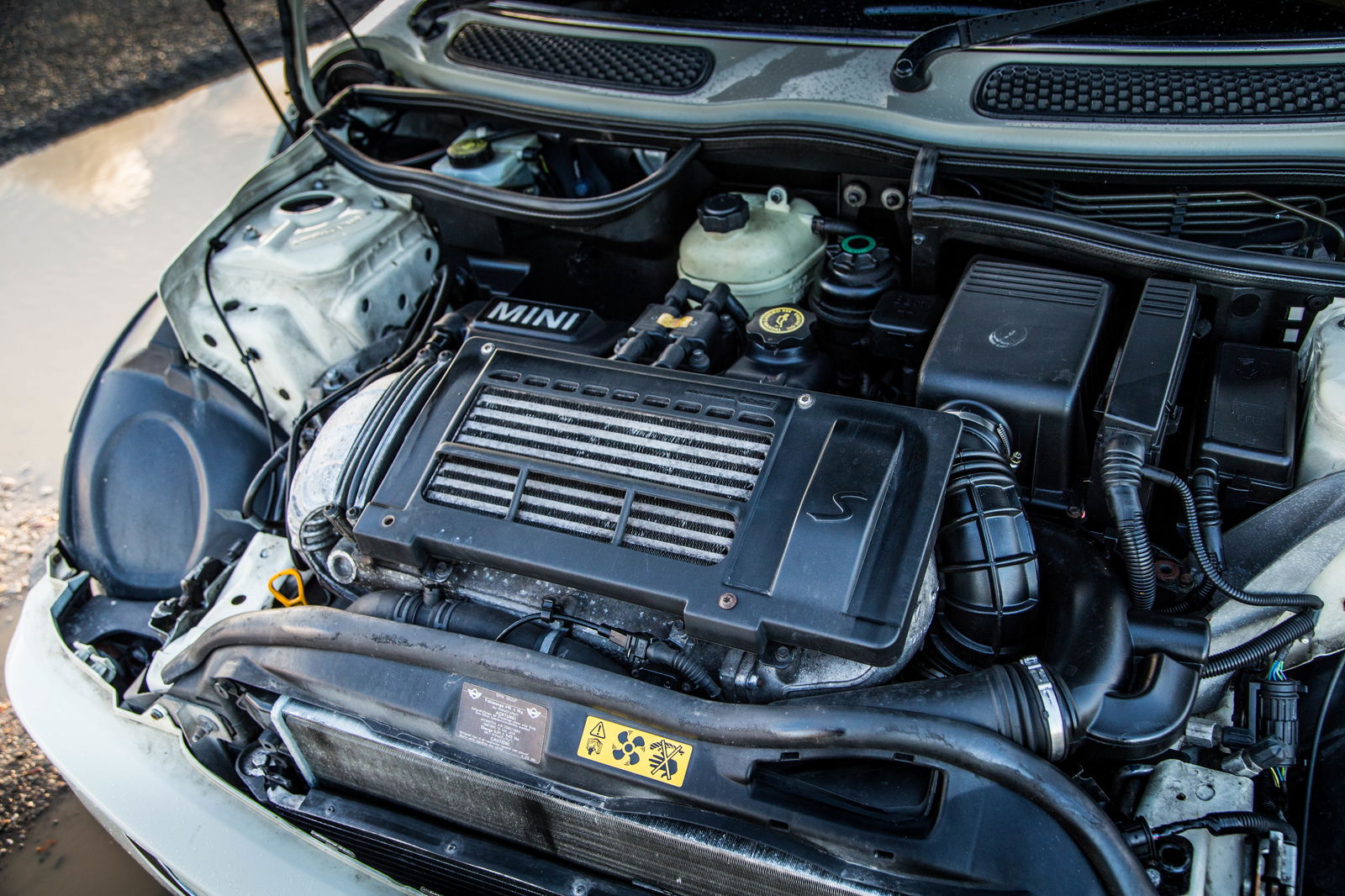 The R53 Mini Cooper S has an Eaton Roots-type supercharger, so yes, it whines!