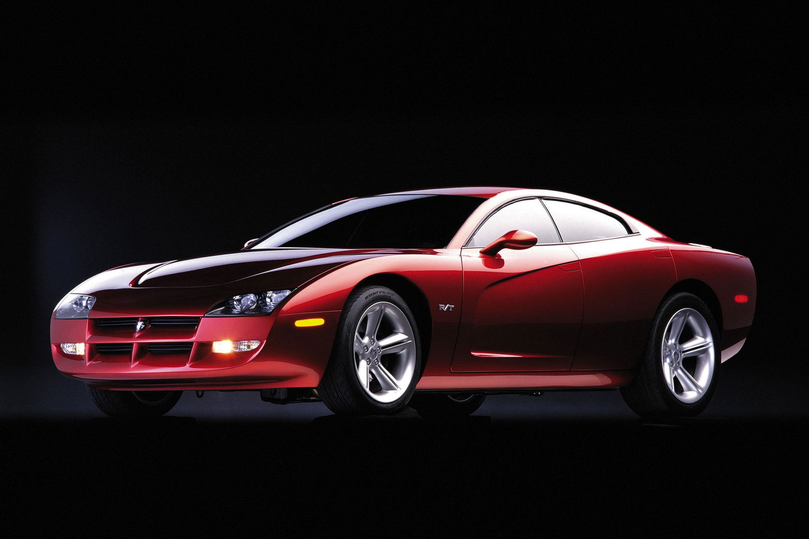 The Dodge Charger R/T concept car was unveiled in 1999. It featured alot of 60's styling from older Chargers, but it also had four doors. Dodge attempted to blend the rear doors into the design so they would not be noticed very easily, as you can see above.