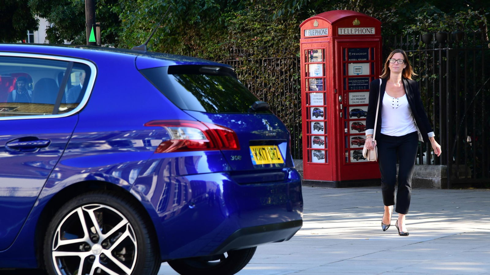 The Smallest Car Dealership In The World Is Launching Inside A Phone Booth